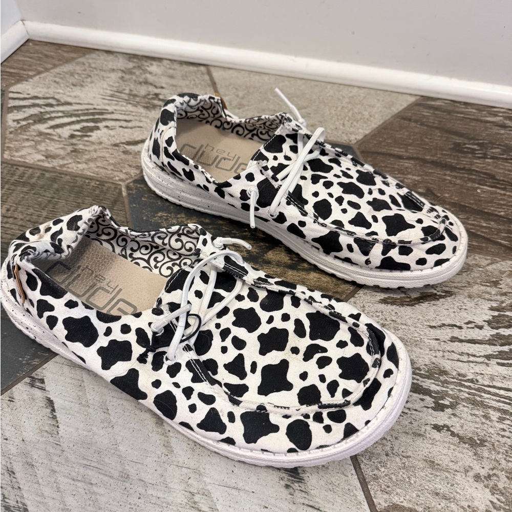 Womens Cow Print Slip-On Hey Dude Shoes - White & Black